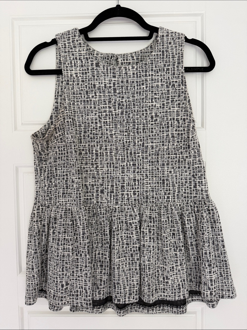 Sleeveless Black & White Textured Peplum Tank Top